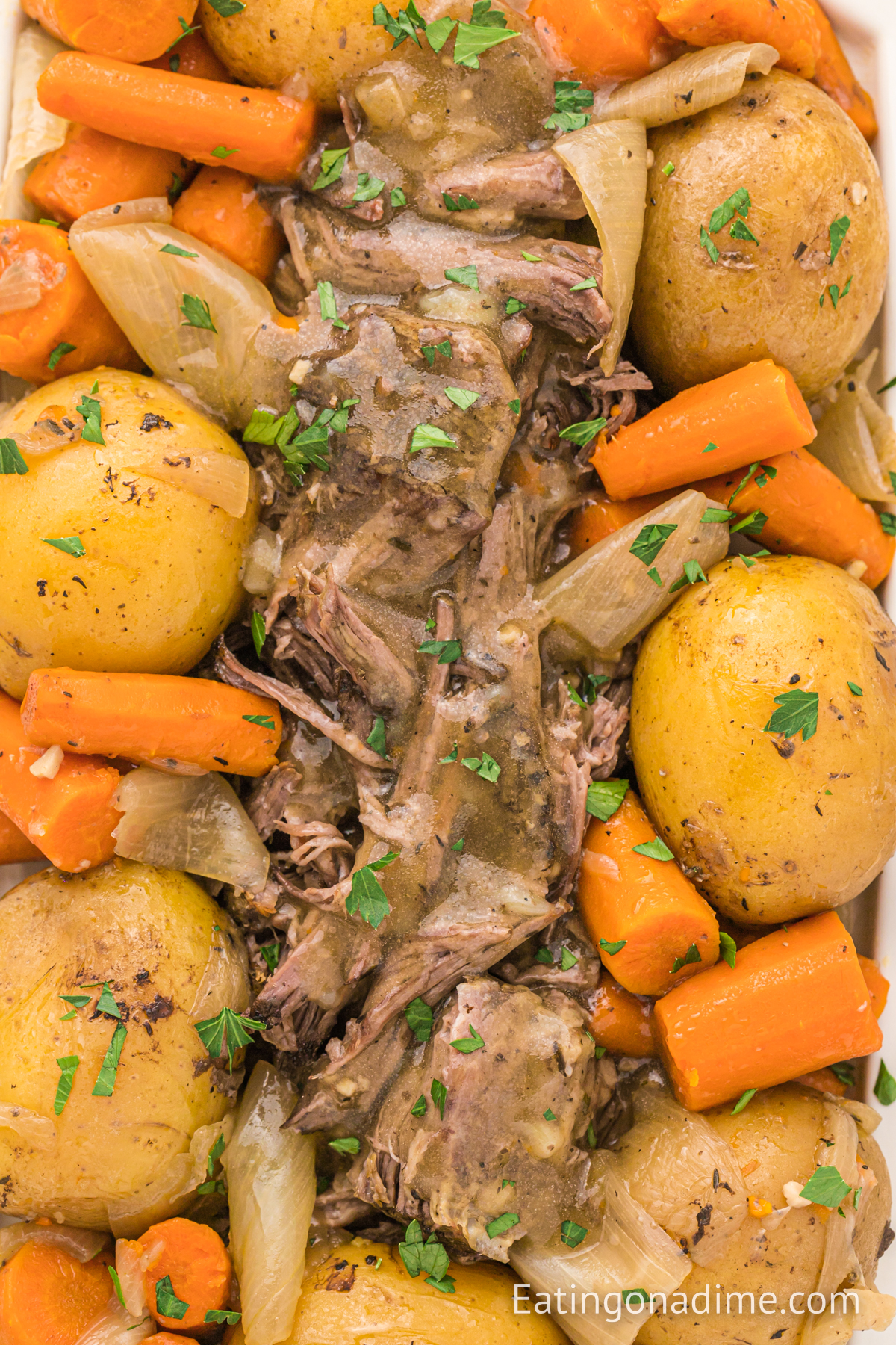 Chuck roast with potatoes and carrots on a platter