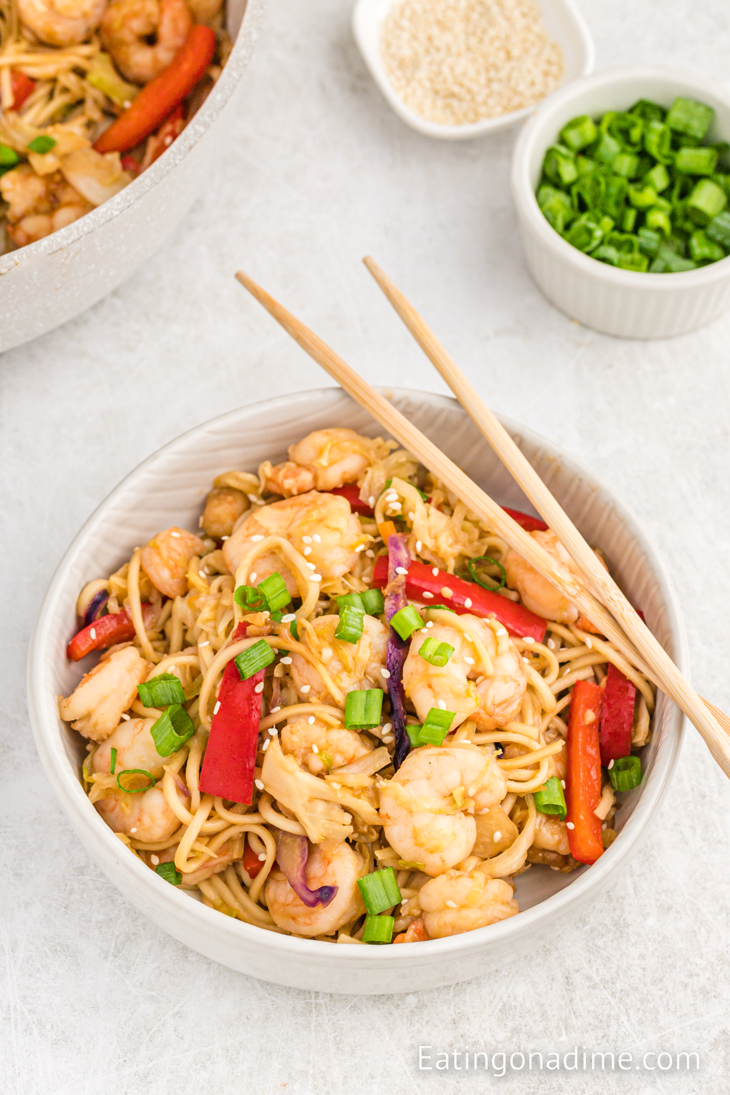 Shrimp Lo Mein in a bowl with chopsticks