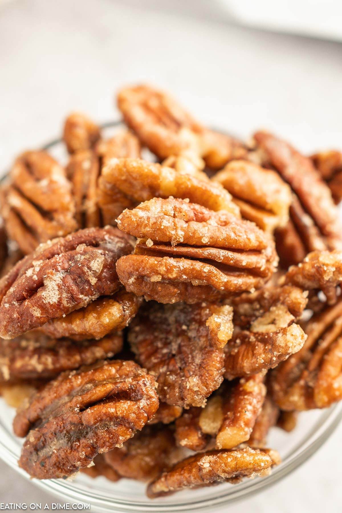 A bowl of candied pecans