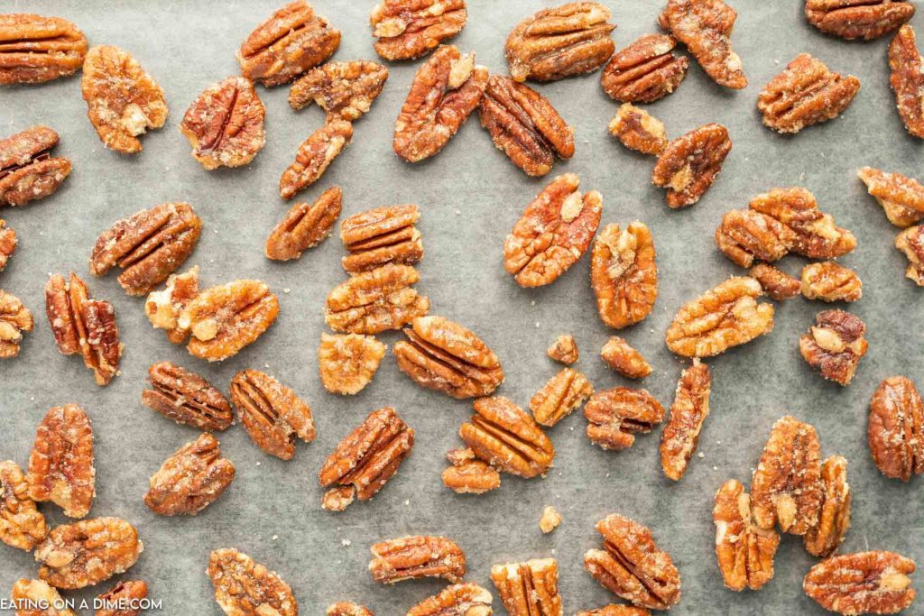 Candied Pecans on a lined baking sheet