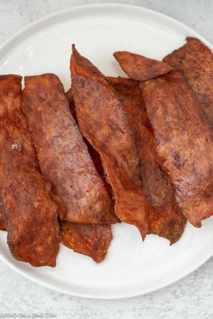 air fried turkey bacon on a white plate