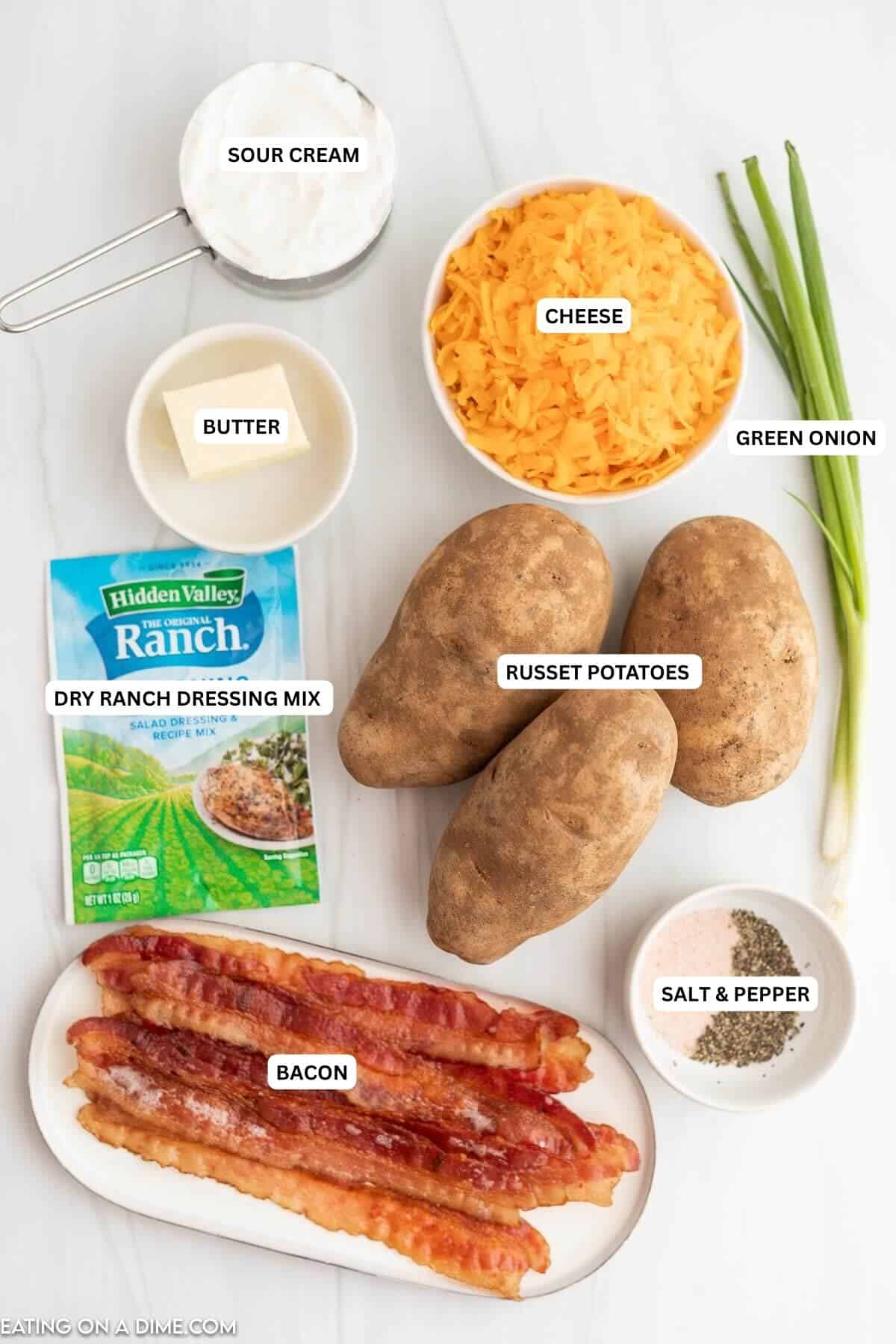 Ingredients for recipe: sour cream, cheese, green onion, butter, russet potatoes, dry ranch mix, bacon, salt and pepper.