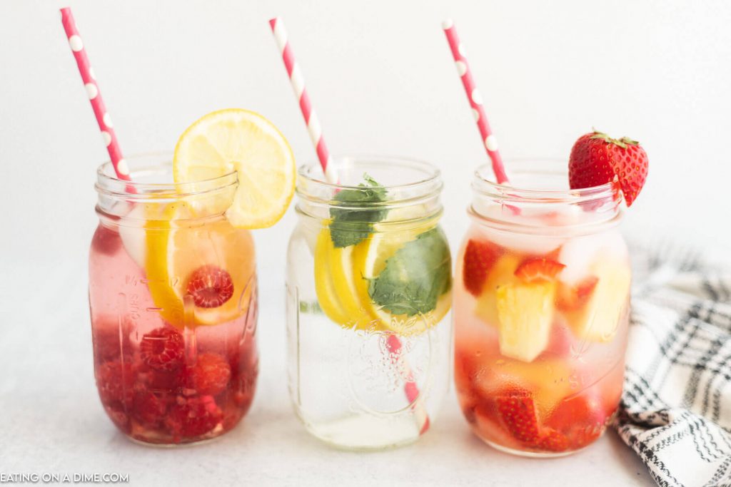 Fruit infused water in mason jars.