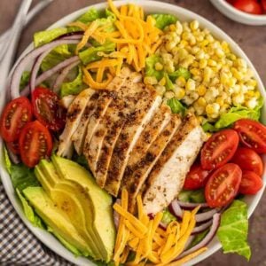 Grilled chicken salad in a bowl.