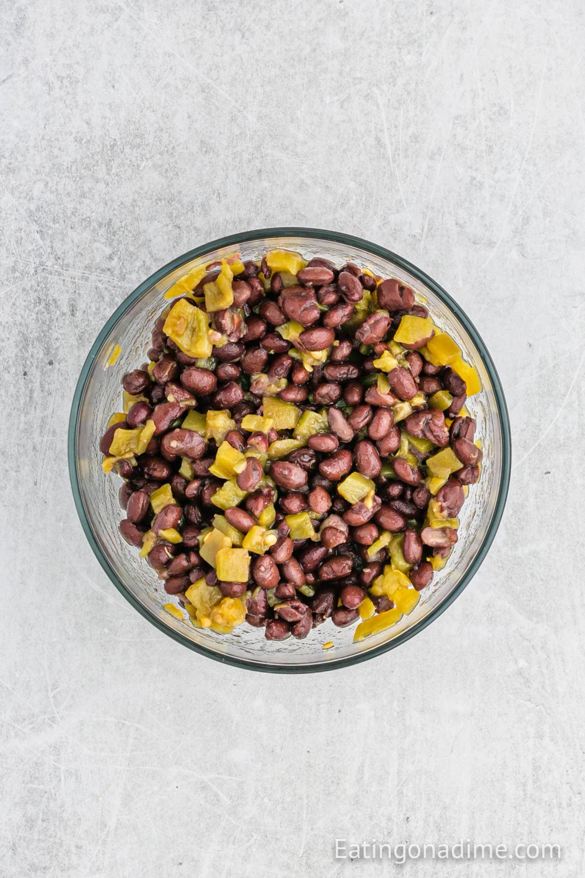 Black beans and green chiles combined together in a bowl