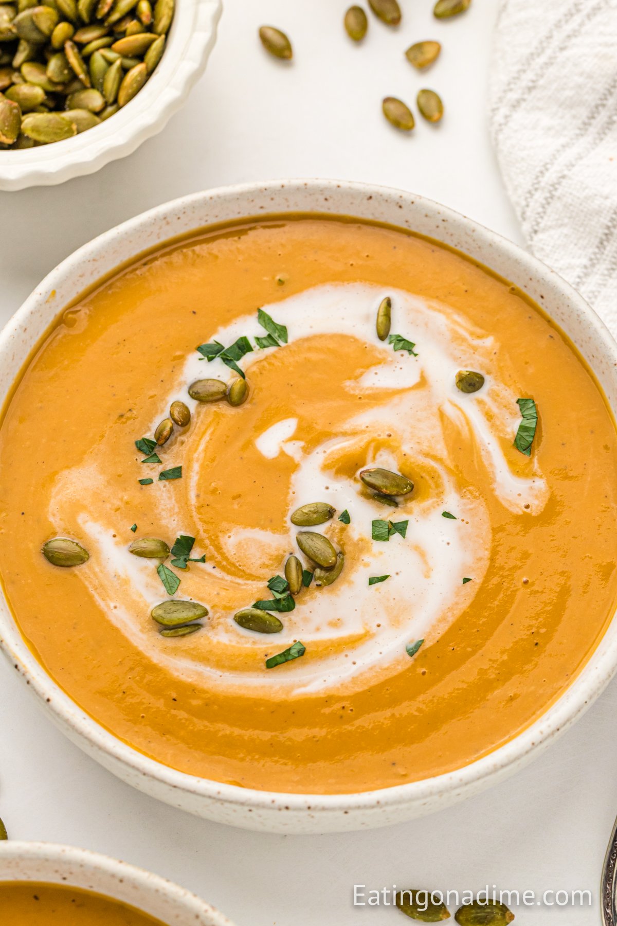 Sweet potato soup in a white bowl