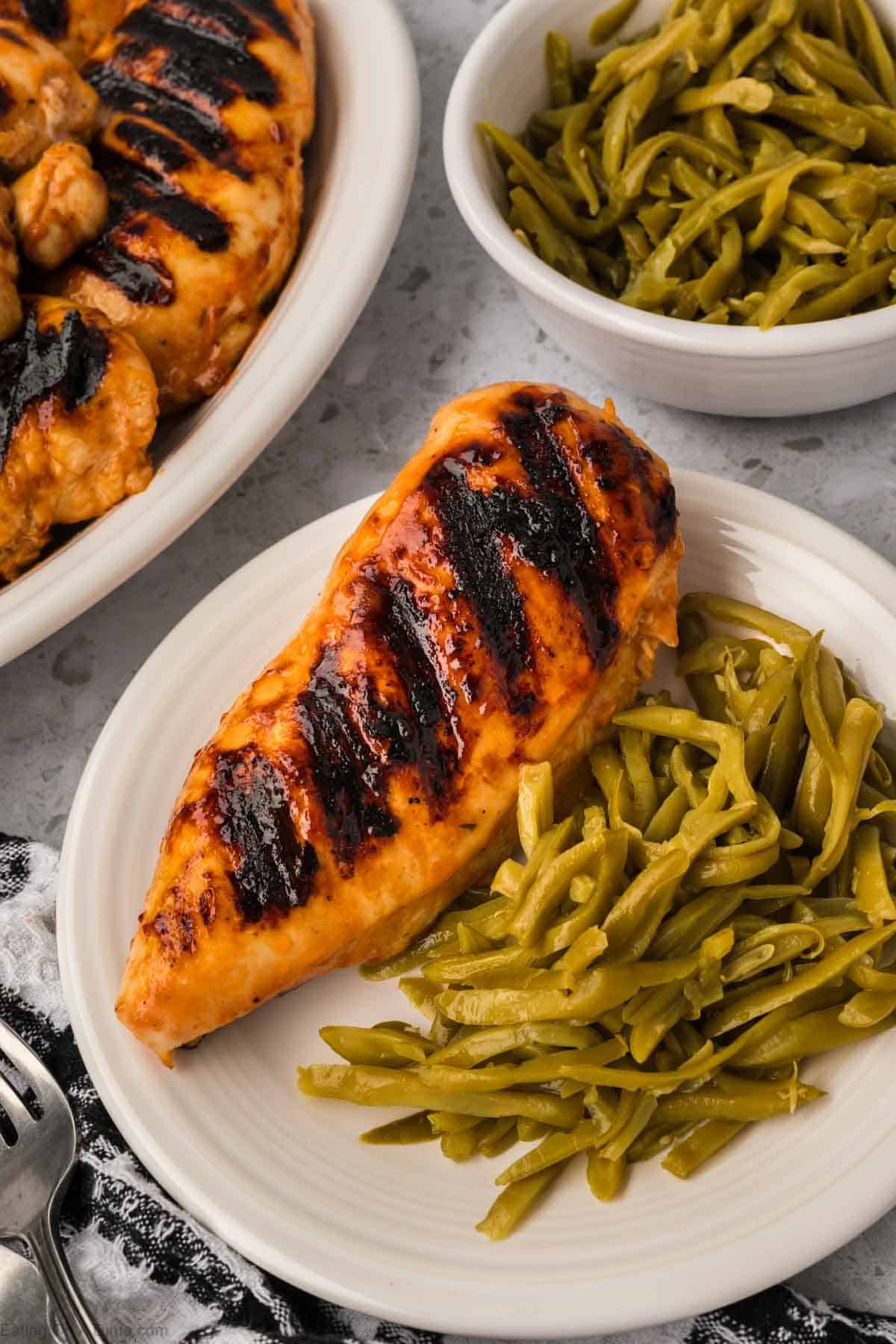 Grilled BBQ Ranch Chicken on a plate with green beans