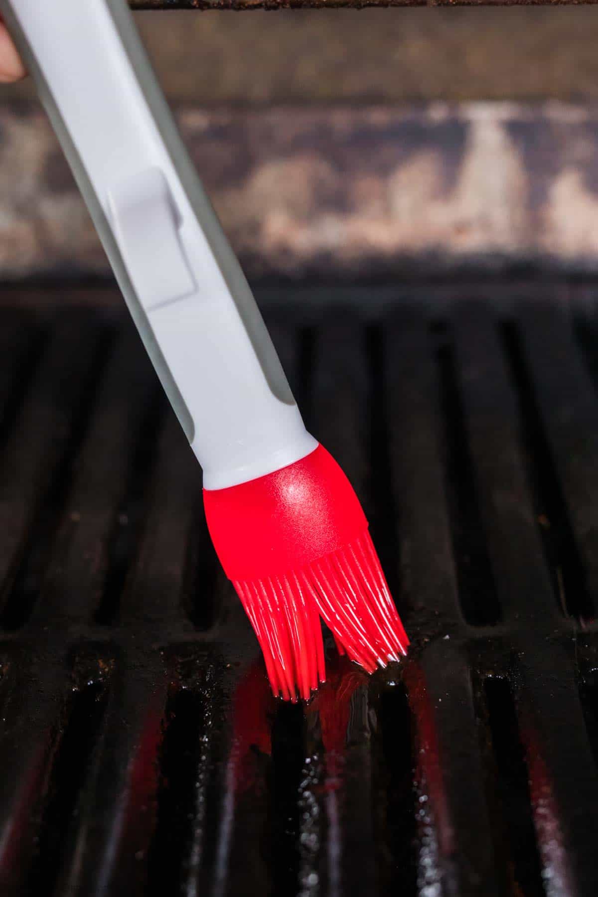 Brushing oil on the grill grates