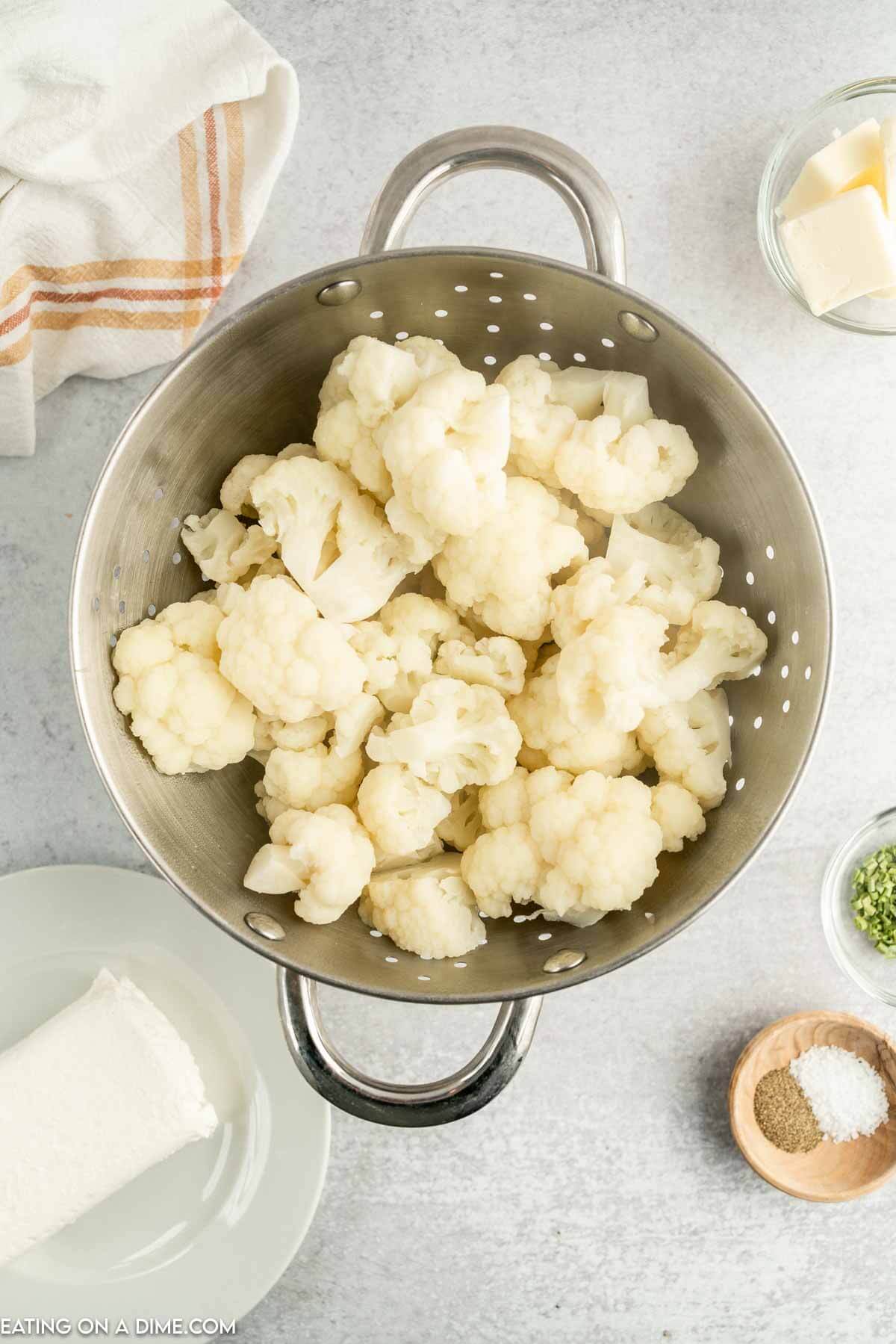 cauliflower in a strainer