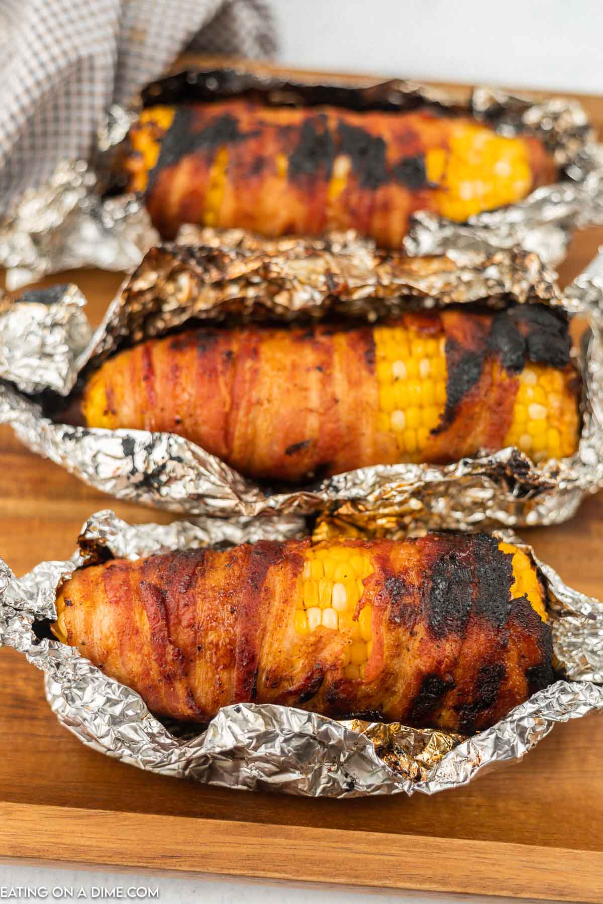 bacon wrapped corn on the cob in foil