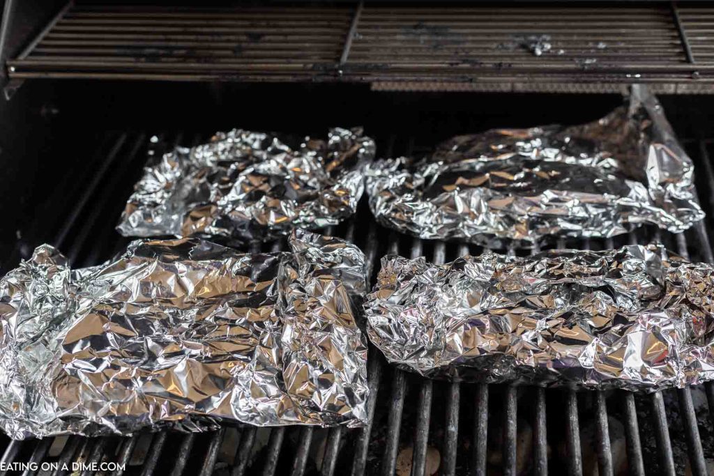 Foil packets sealed and on grill. 