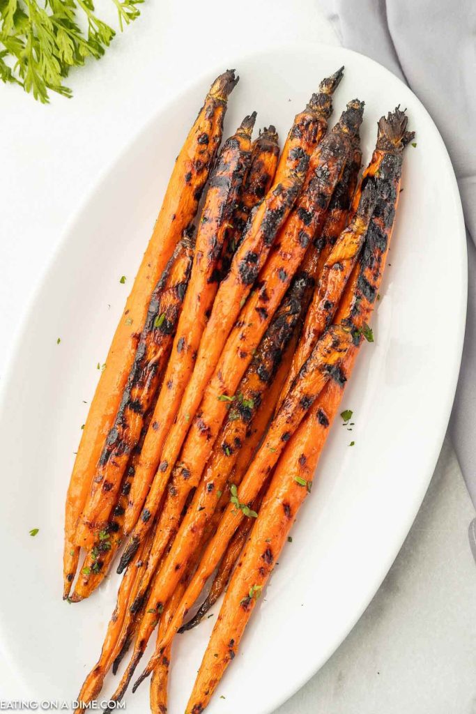 Grilled carrots on a plate. 