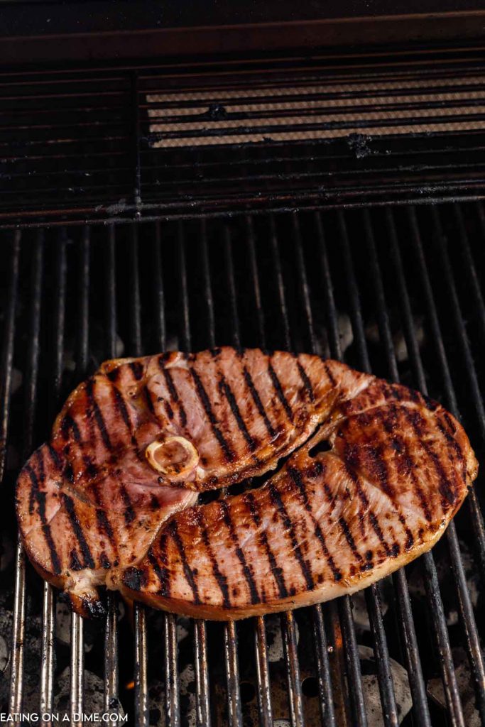 Ham steak on the grill. 