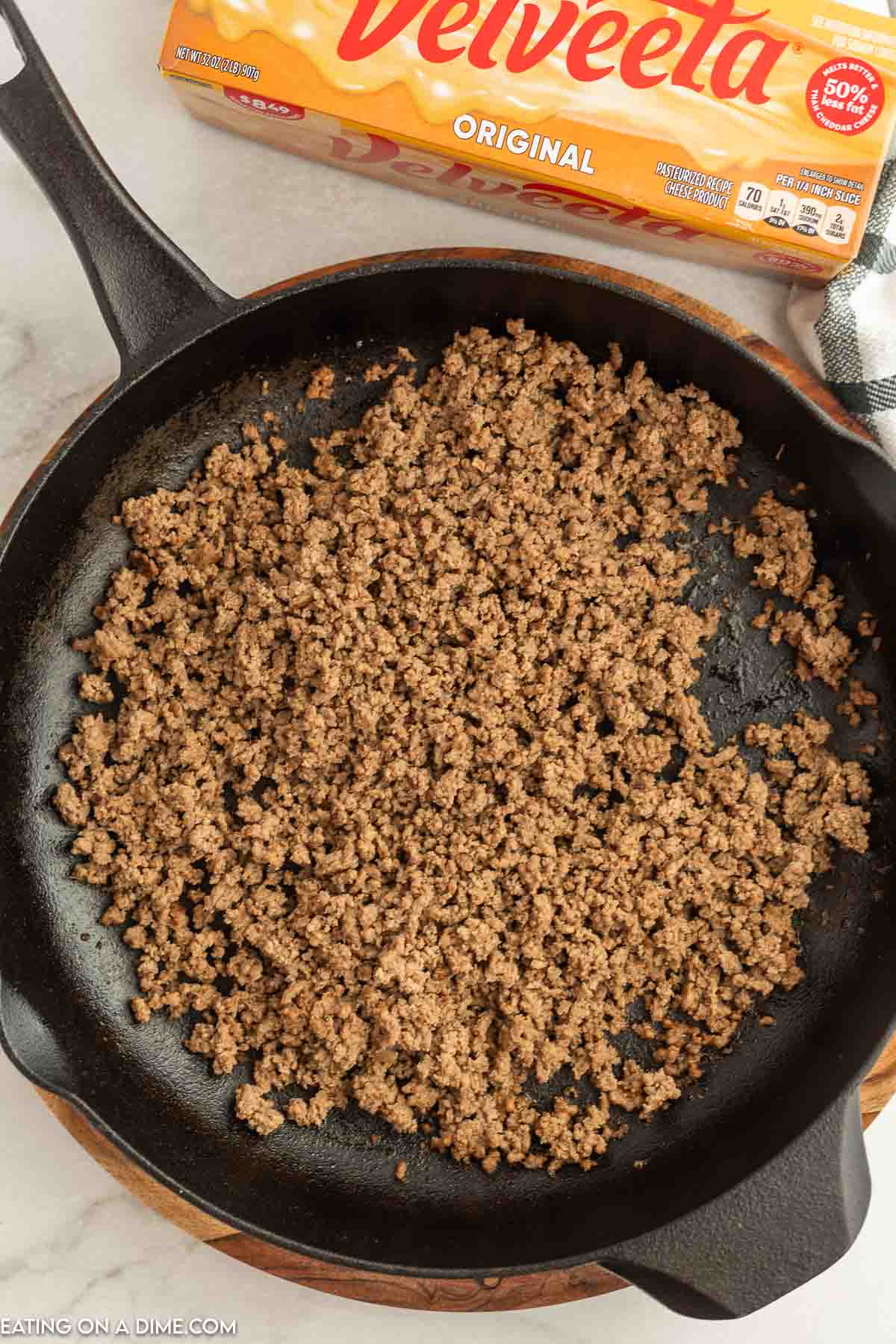 Browning the meat in a cast iron skillet