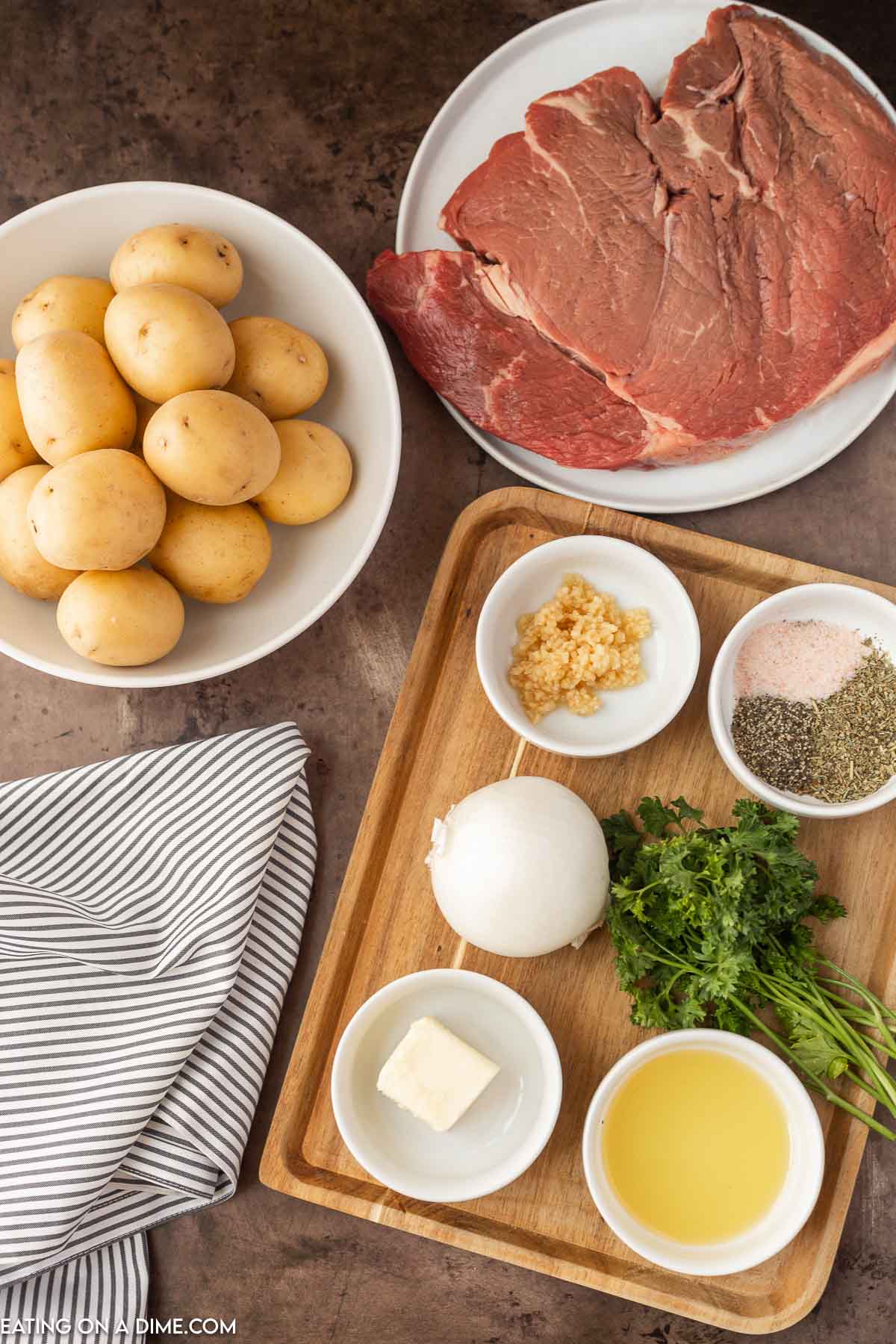 Steak and potato foil pack ingredients - Sirloin Steak, baby potatoes, onion, parsley, garlic, italian seasoning, salt, pepper, butter