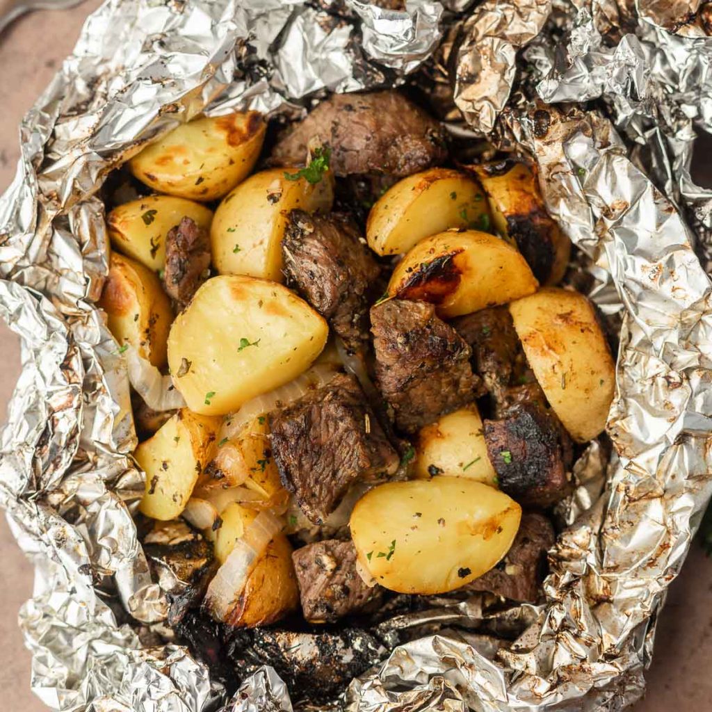 Steak and potato foil pack opened and ready to serve. 
