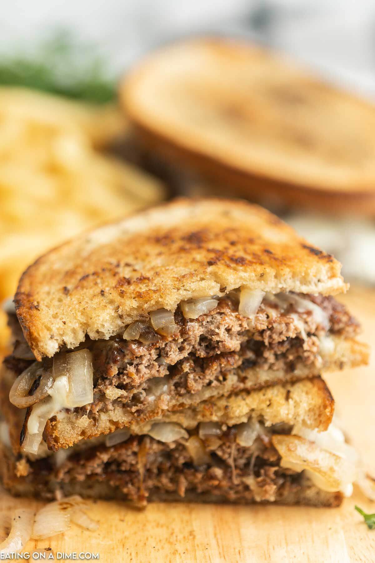 Freddy's patty melt cut in half. 