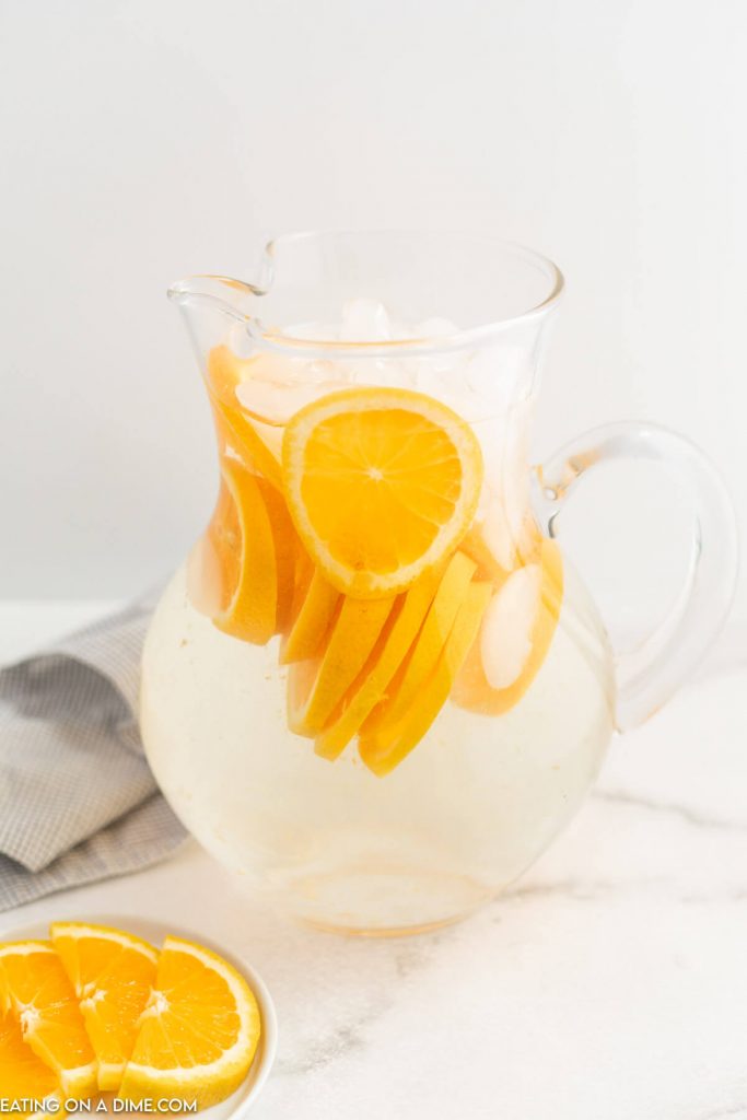 A pitcher of orange water