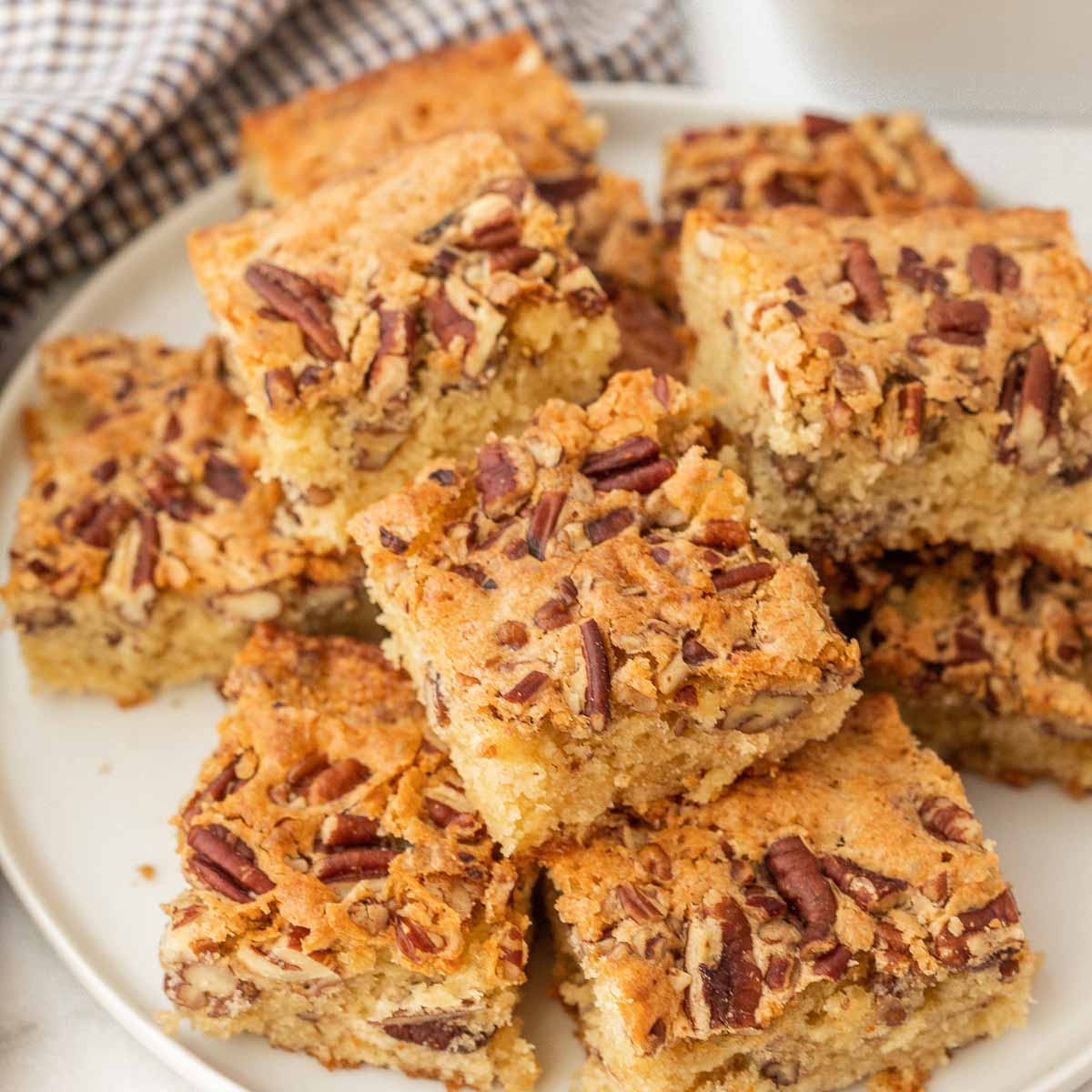 Pecan Bread stacked on a white plate