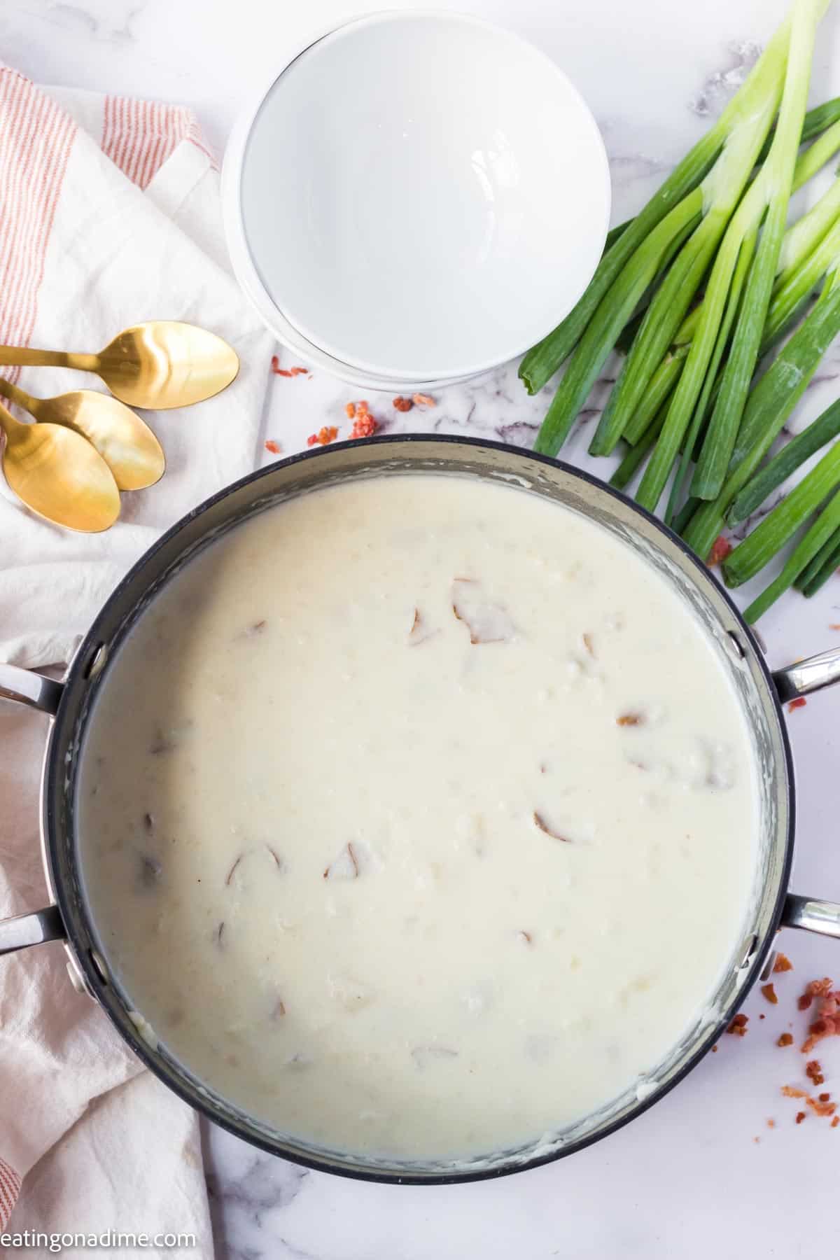 Potato soup in a large pot.