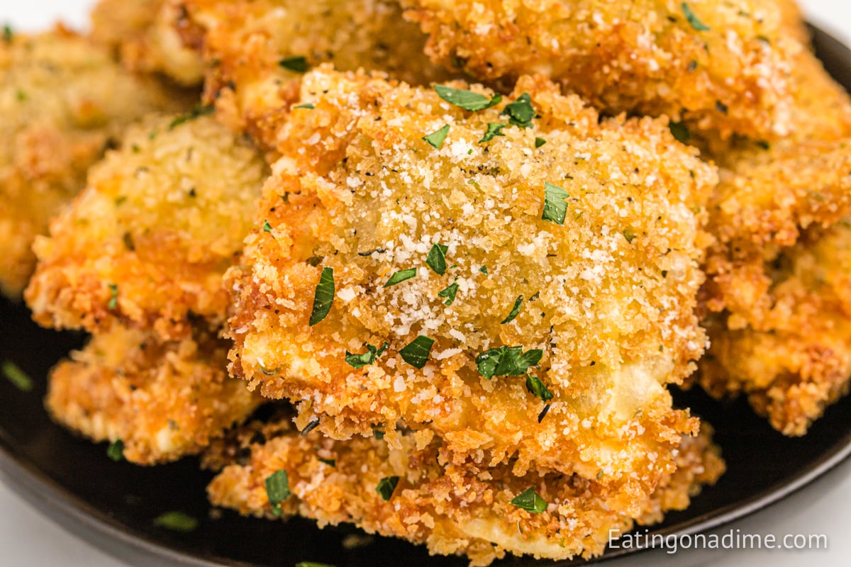 Close up image of toasted ravioli on a plate 