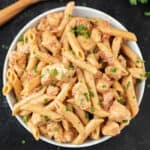 A bowl of chicken pasta.