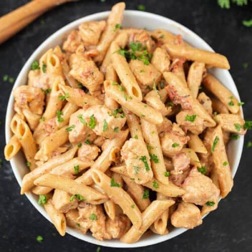 A bowl of chicken pasta.