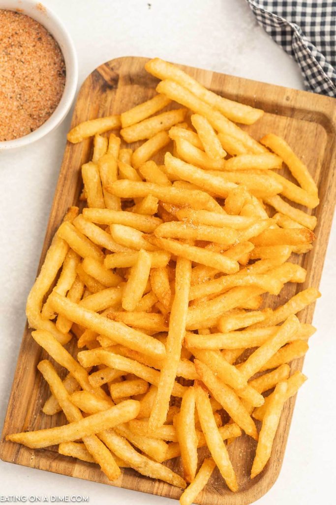Fries on platter with Ffreddy's fry seasoning.