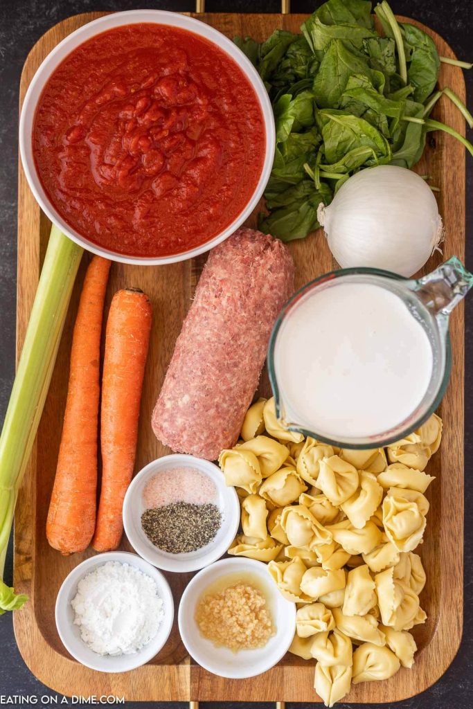 Ingredients needed - italian sausage, onion, carrots, celery, minced garlic, pepper and salt, crush tomatoes, chicken broth, tortellini, spinach, heavy whipping cream cornstarch