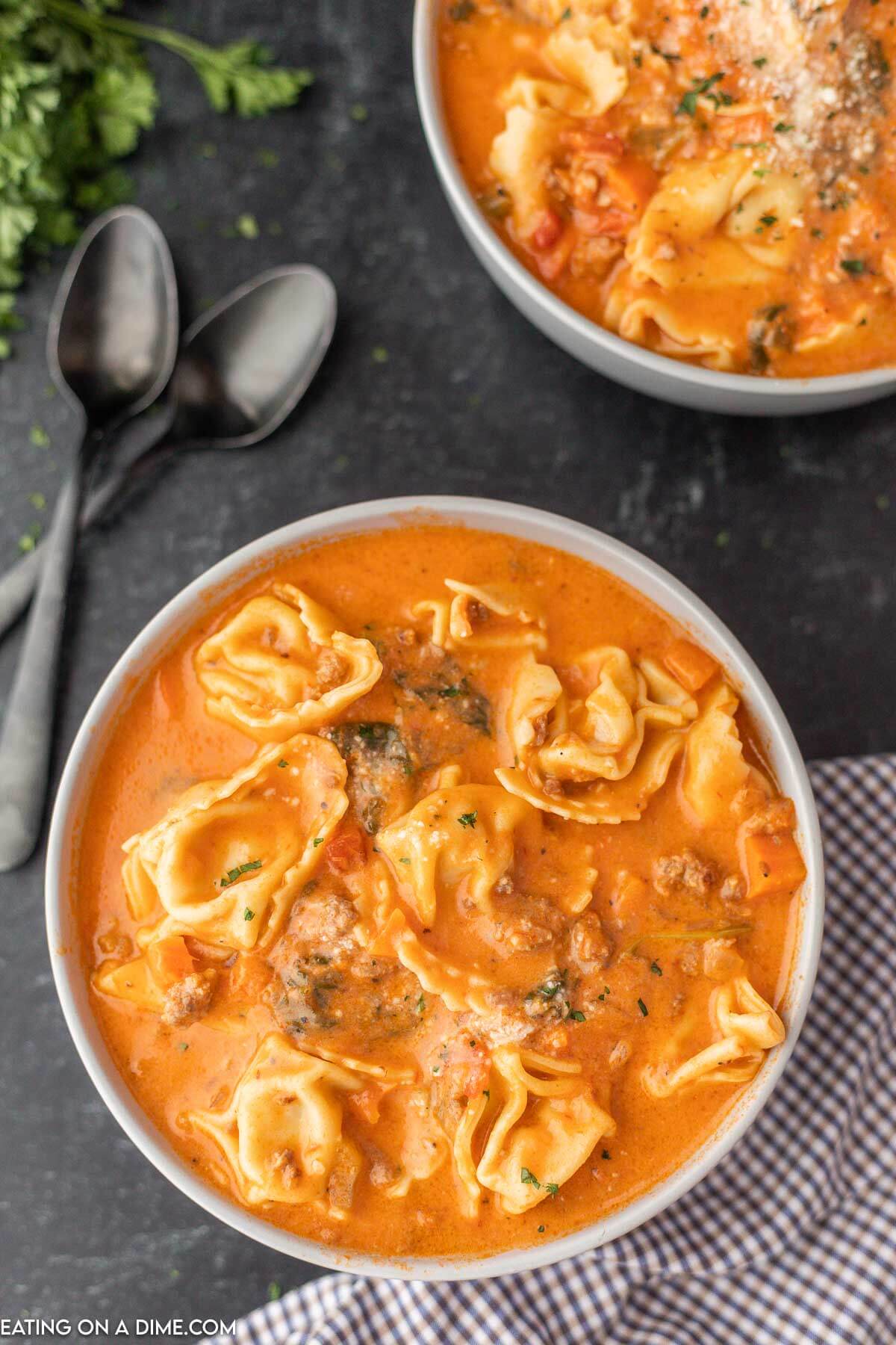 Tortellini Soup in a white bowl