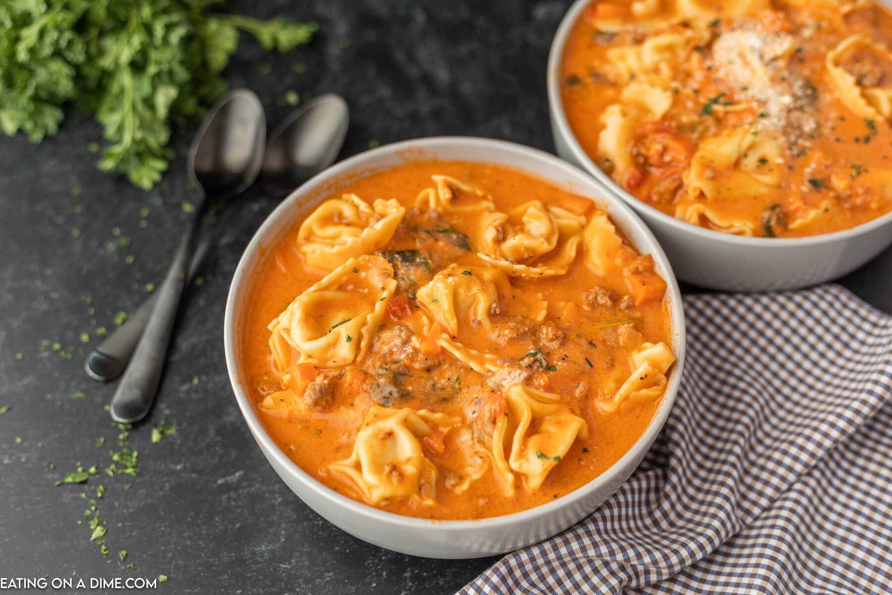 Tortellini Soup in a white bowl