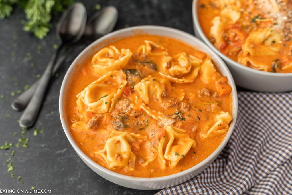 Tortellini Soup in a white bowl