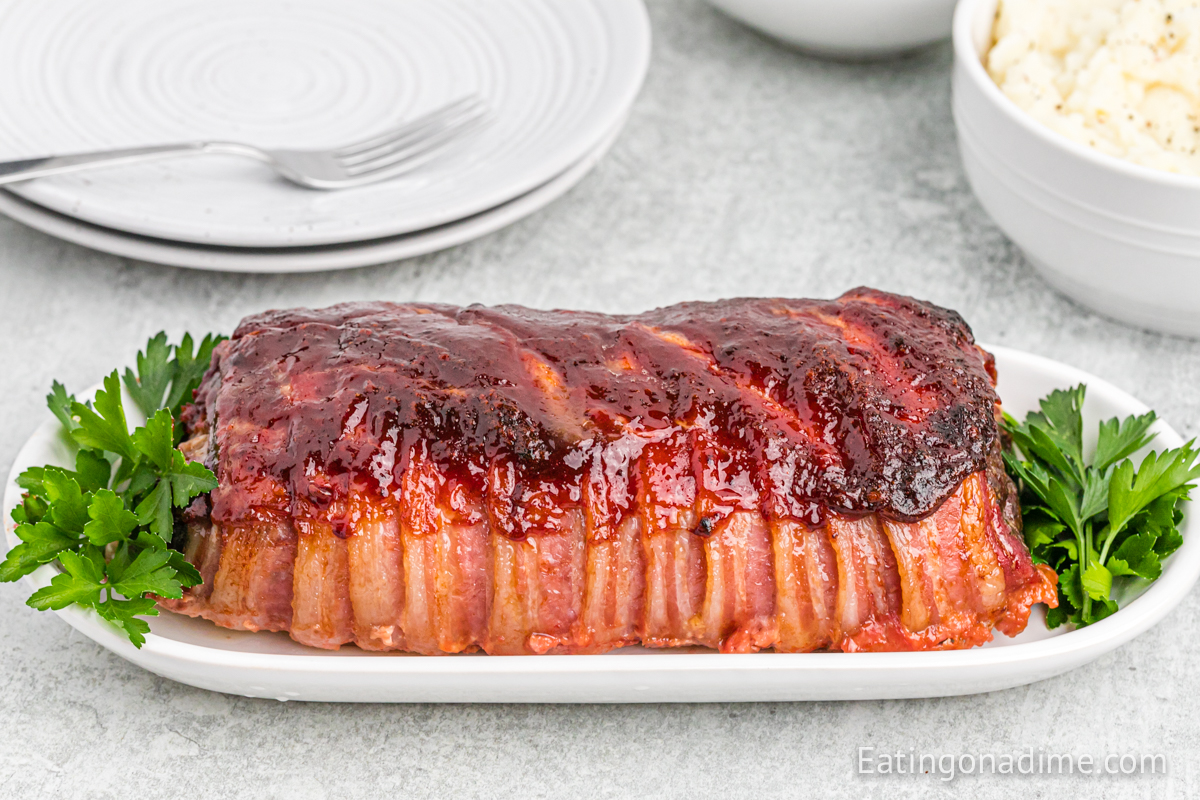 Bacon Wrapped Meatloaf on a platter