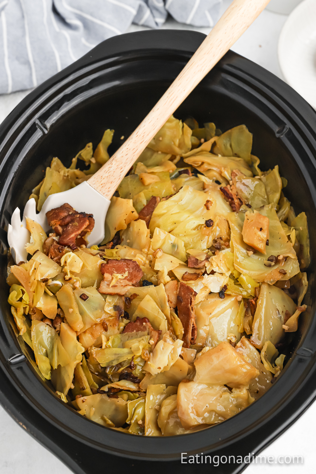 Slow cooker cabbage with a spoon