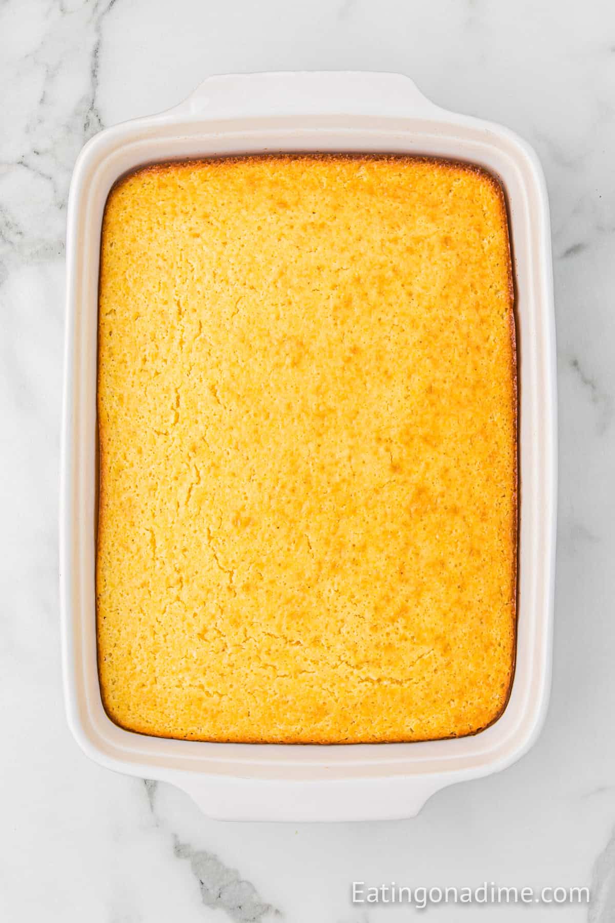 Baked cornbread in a baking dish.