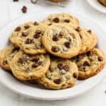 Chocolate Chip Pudding Cookies stacked on a plate.