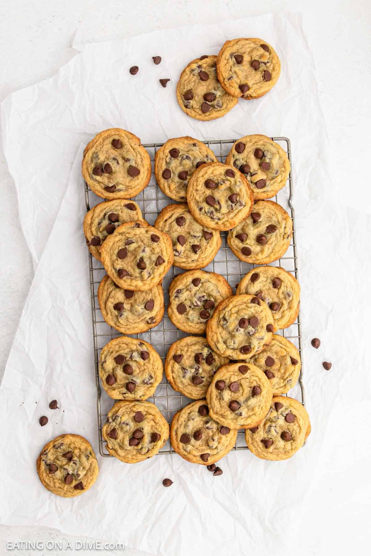 Baked Chocolate chips cookies on a wire rack.