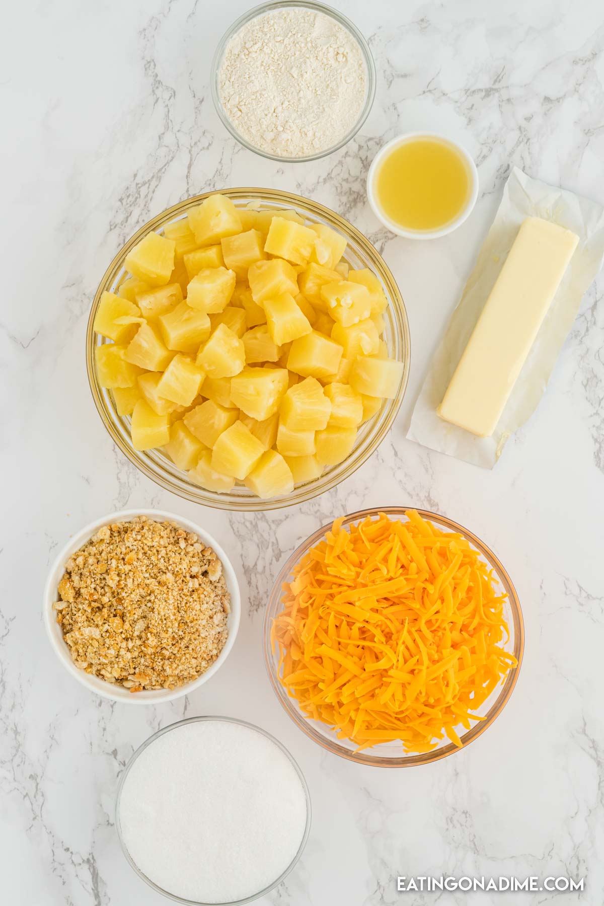 Ingredients needed - sugar, flour, cheese, pineapple chunks, crackers, butter