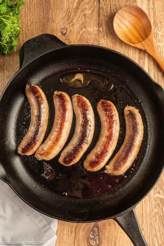 Close up image of Bratwurst in a skillet