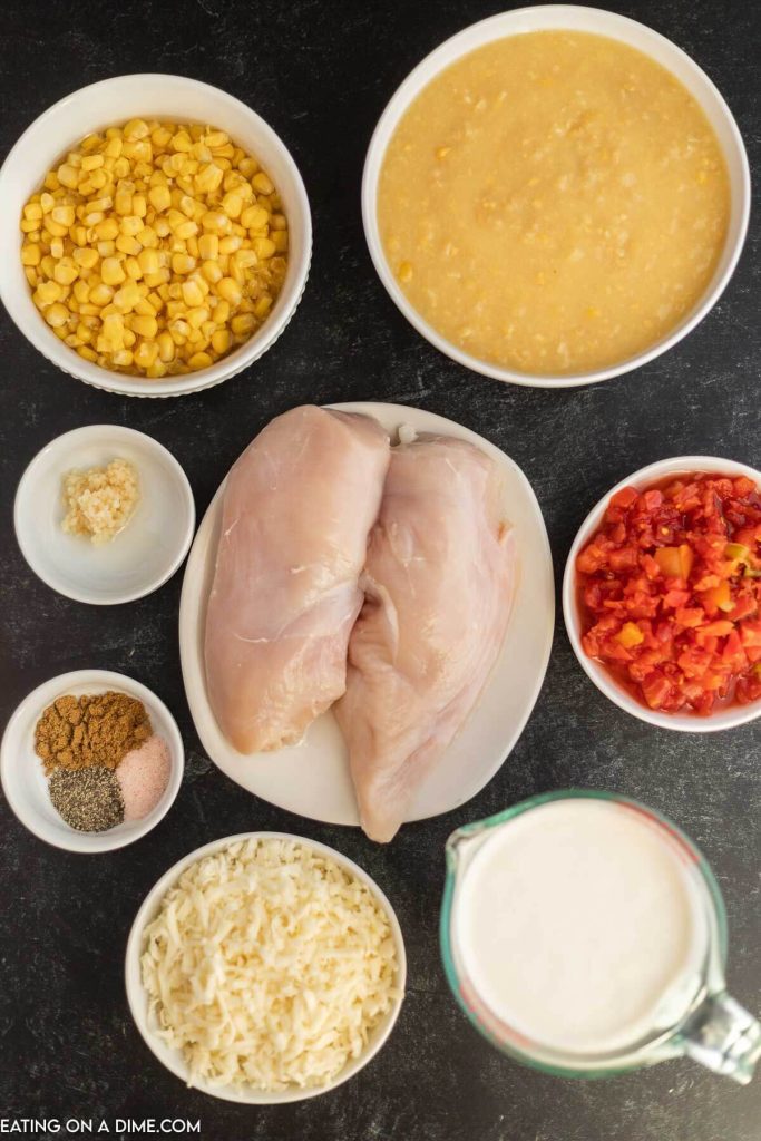 Ingredients needed - chicken breast, chicken broth, corn, creamed corn, diced tomatoes, salsa verde, cumin, salt, minced garlic, heavy cream, cheese