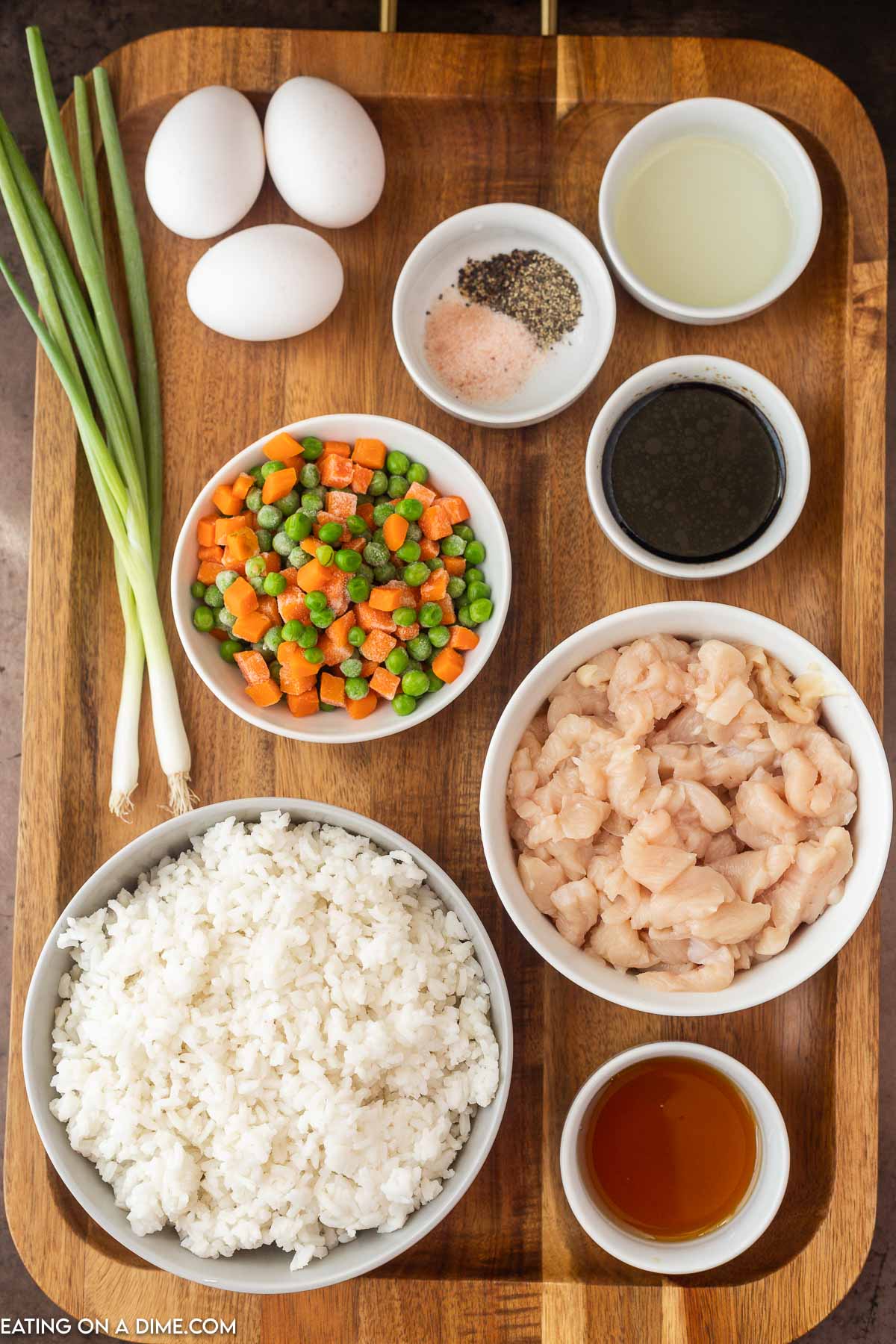 Ingredients needed - chicken breast, oil, frozen vegetables, eggs, white rice, soy sauce, salt and pepper, green onions