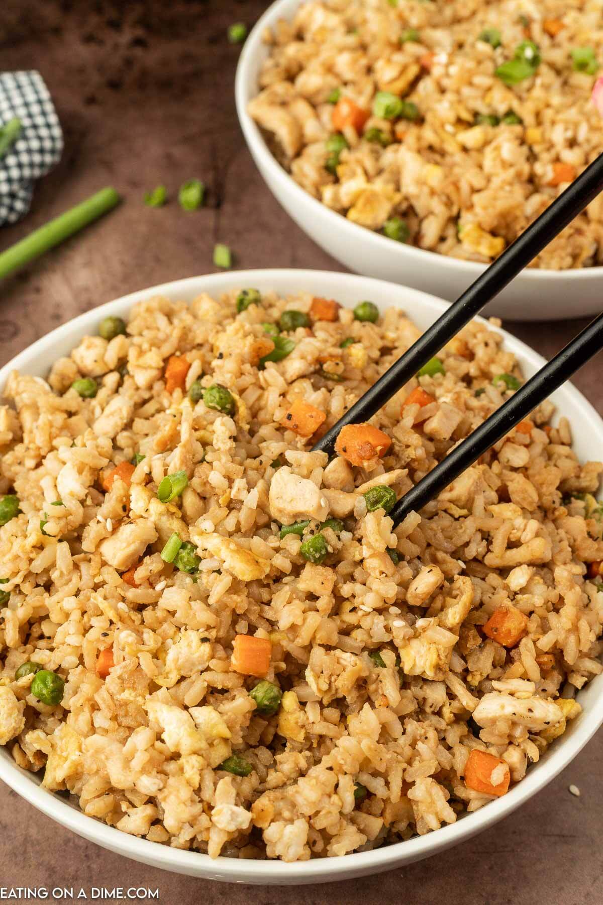 Chicken Fried Rice in a white bowl with chopsticks