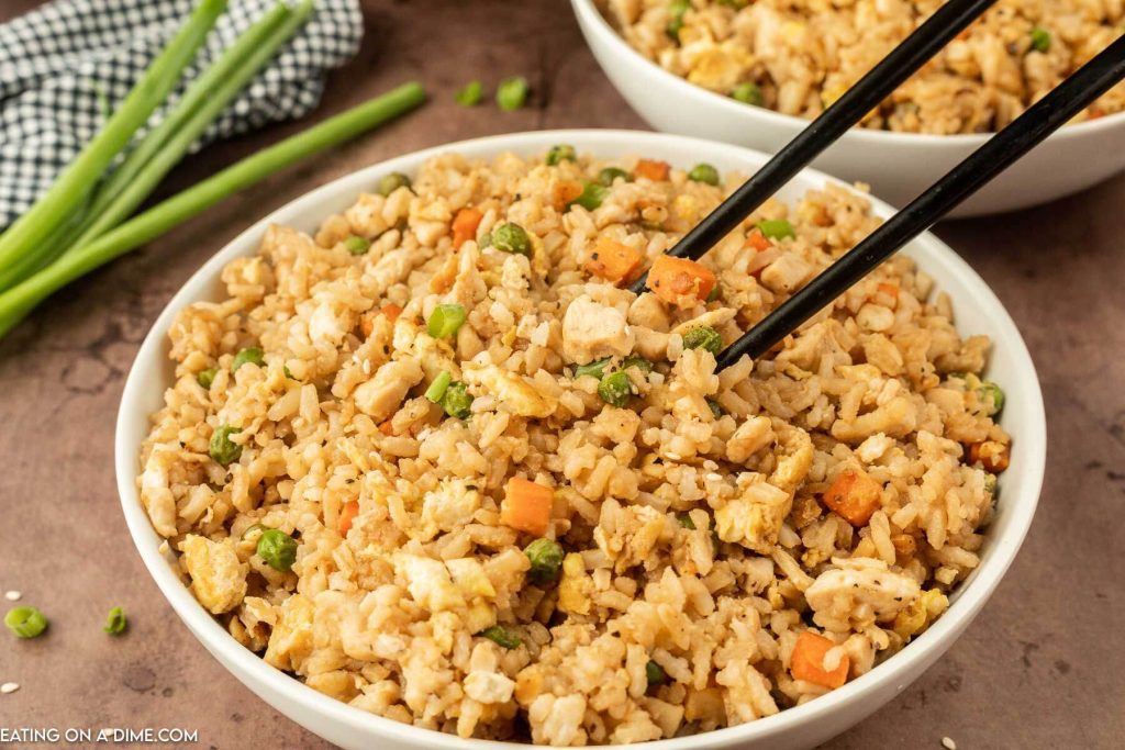 Chicken Fried Rice in a white bowl with chopsticks