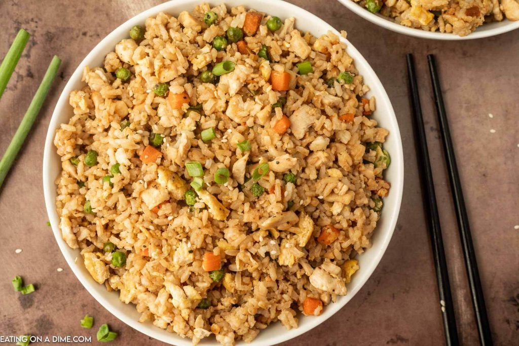 Chicken Fried Rice in a white bowl with chopsticks