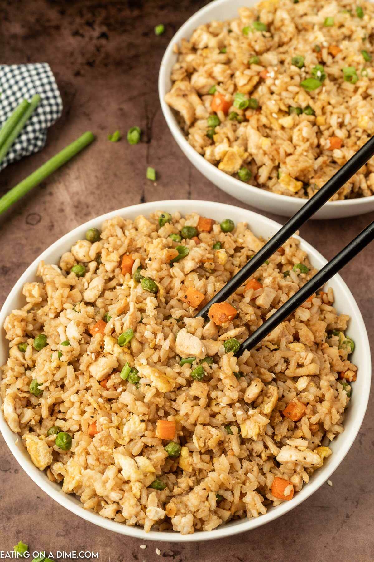 Chicken Fried Rice in a white bowl with chopsticks