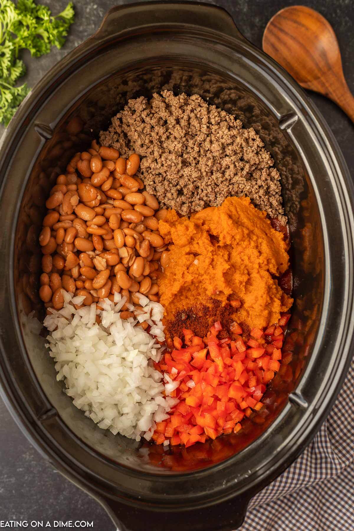 Adding the ingredients into the slow cooker