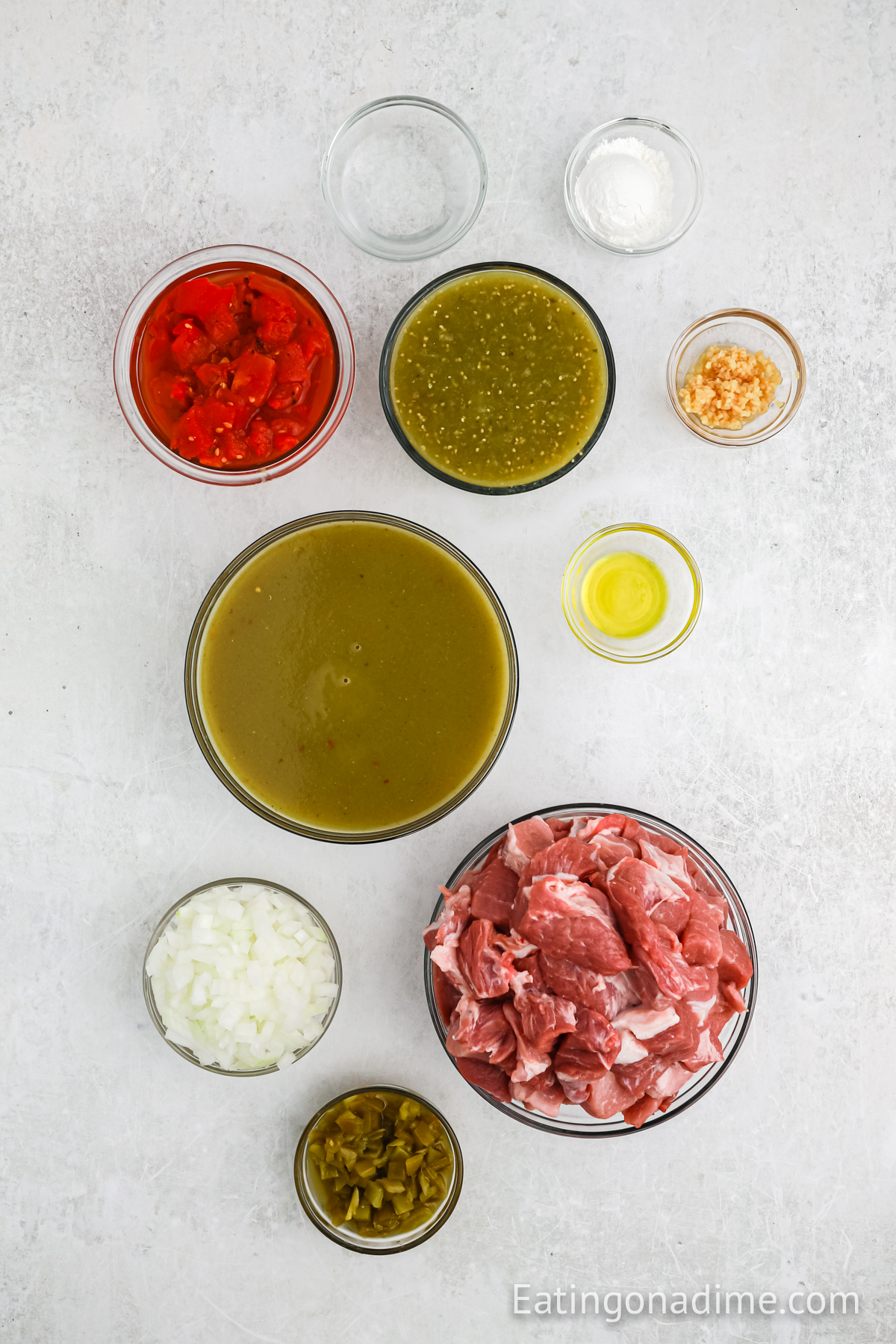 Pork Shoulder, olive oil, green enchilada sauce, salsa verde, diced tomatoes, green chiles, minced garlic, white onion, cornstarch, cold water