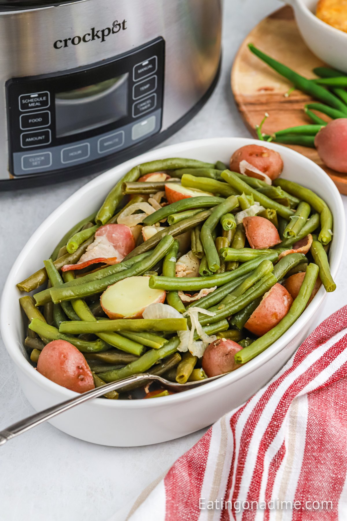 Green and potatoes in a serving dish