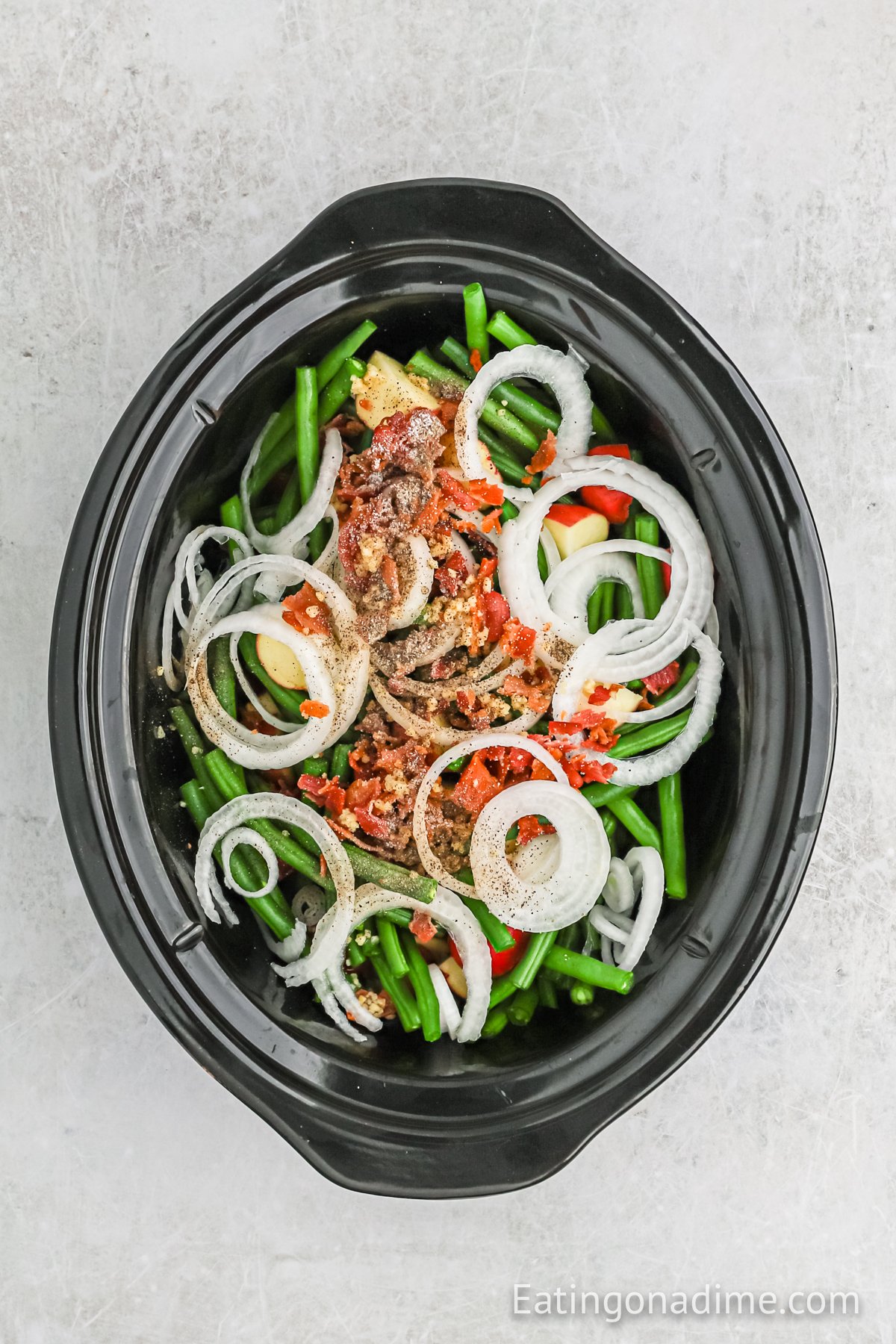 All the ingredients added to the slow cooker