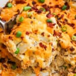 Crack Chicken Casserole with a serving on a spatula.